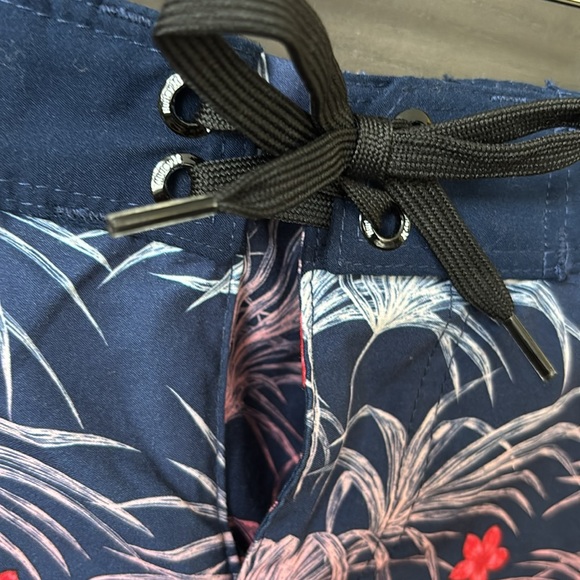 Hurley Boy’s Blue and Red Board Shorts with Tropical Design - Picture 5 of 13